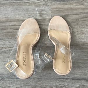 Shoedazzle clear heels in woman’s size 6.5.